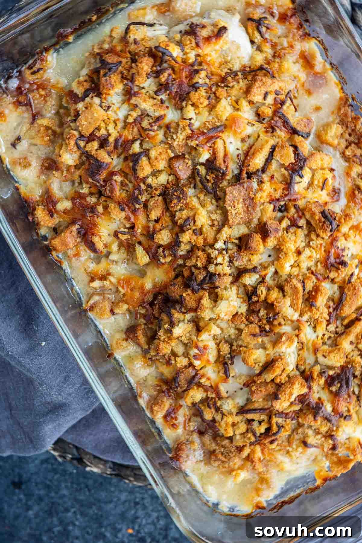 Chicken Caesar Bake with a golden crouton topping in a casserole dish